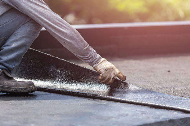 Professional Basement Waterproofing technician working in West Harrison, IN